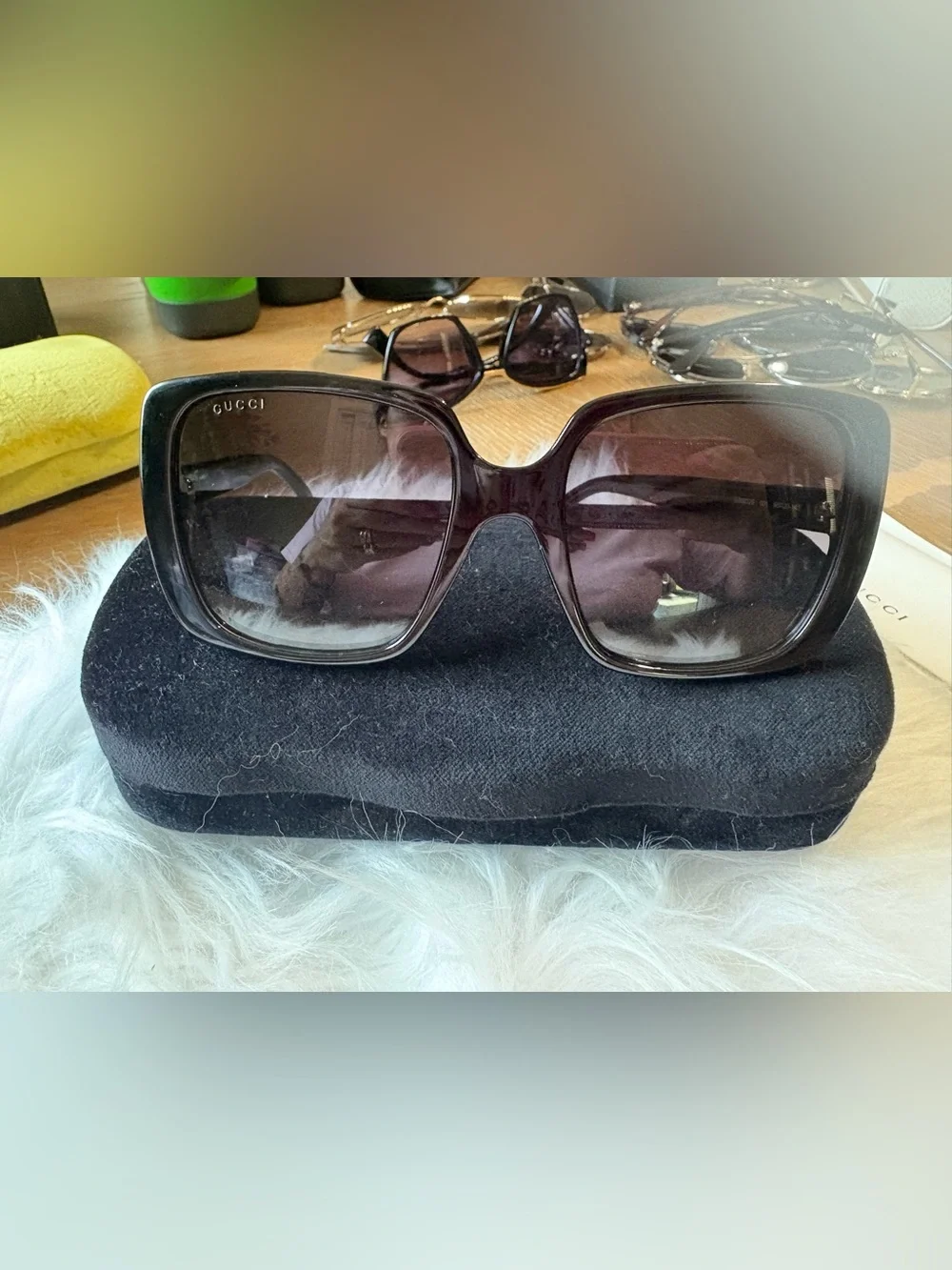 Gucci Black Frame Sunglasses with Gold Logo Detailing